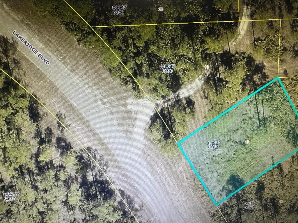 Aerial overview of property's location featuring property parcel outlined