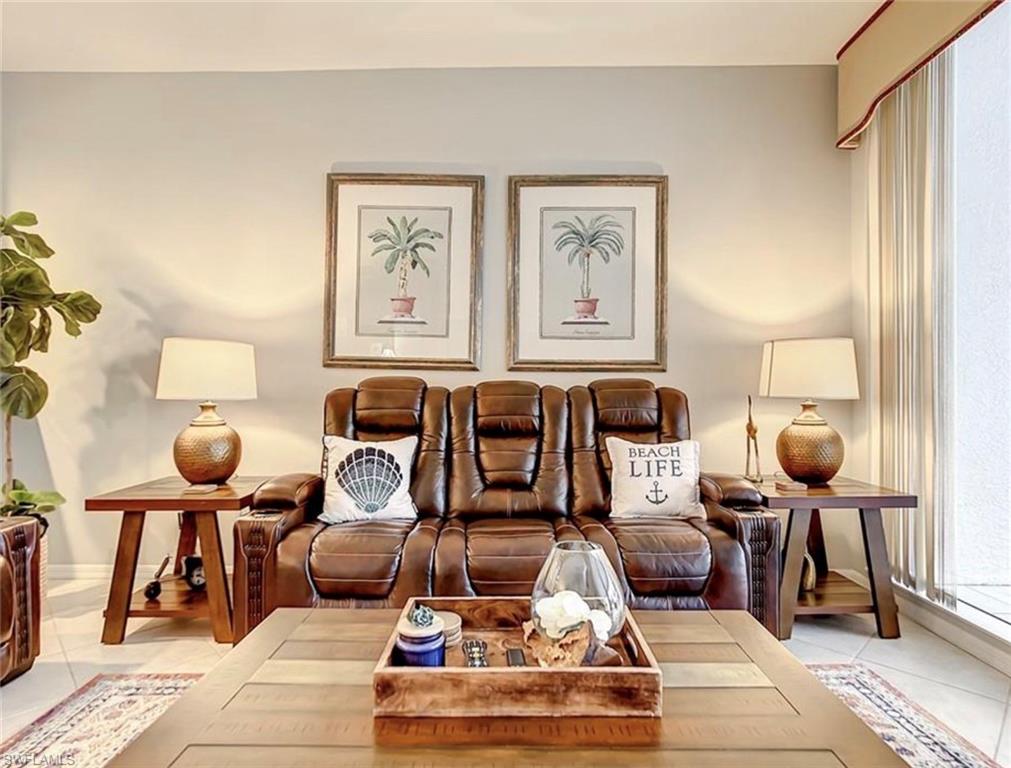 Living room with light tile patterned floors