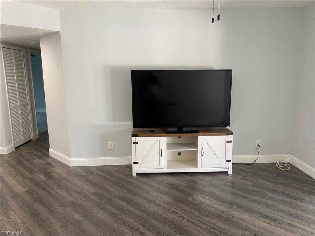 Detailed view of wood finished floors and baseboards
