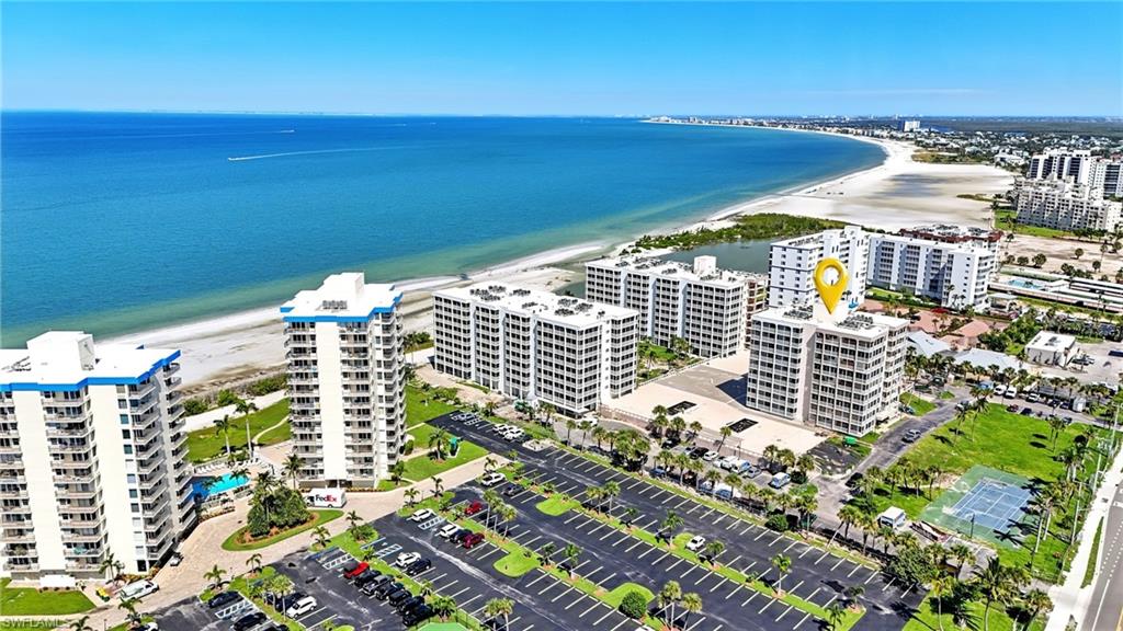 Drone / aerial view of condominium complex / building and extended coastline - Virtually Edited Image