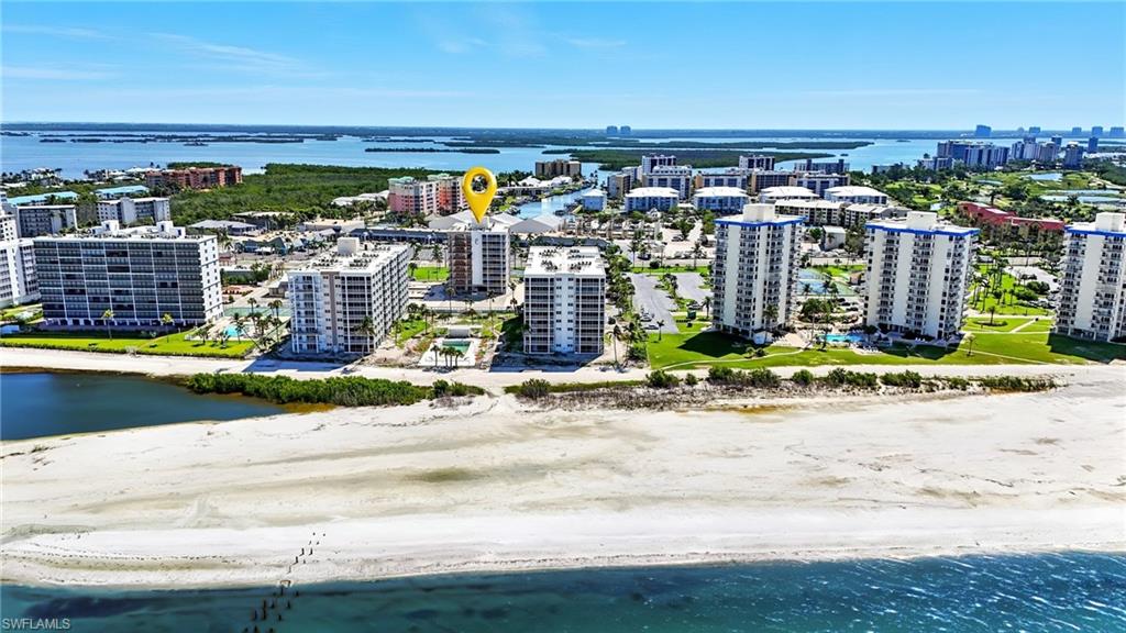 View of urban area featuring a large body of water - Virtually Edited Image