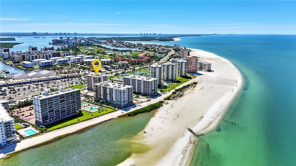 View of urban area featuring expansive beach - Virtually Edited Image