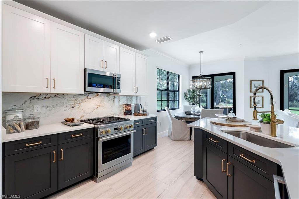 Gas range with brass knobs and hardware