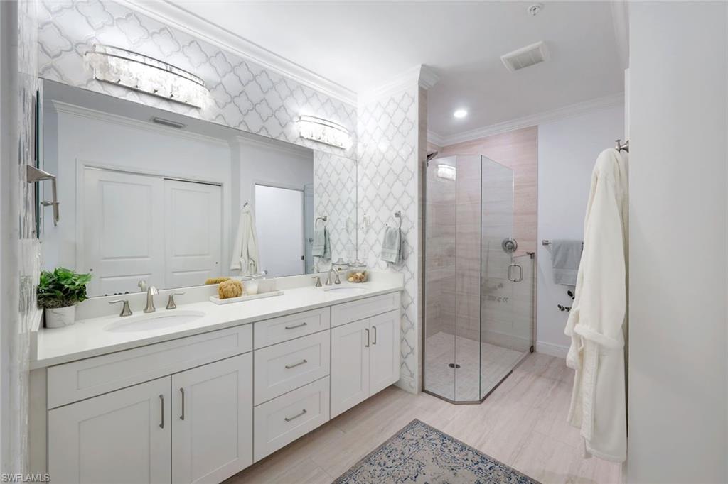 Double sinks and walk in shower