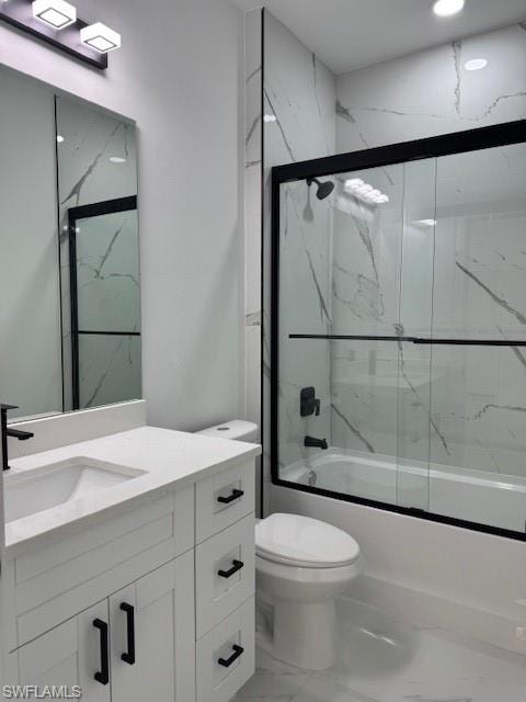 Bathroom with combined bath / shower with glass door, vanity, and light marble finish flooring