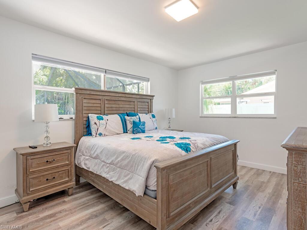 Bedroom featuring baseboards and light wood-style flooring