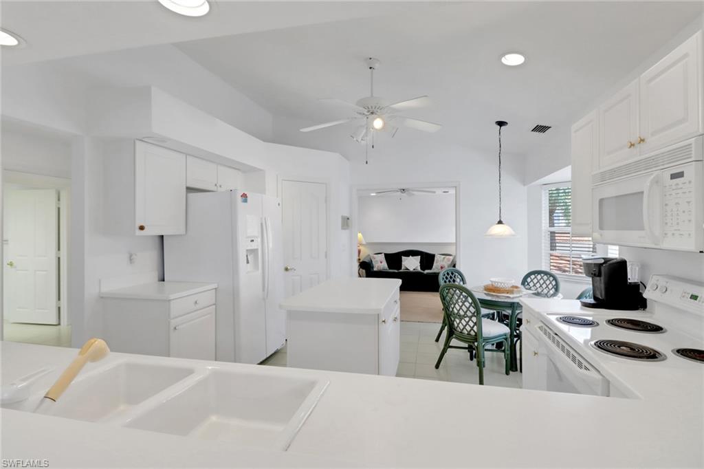 Kitchen view looking towards cozy den