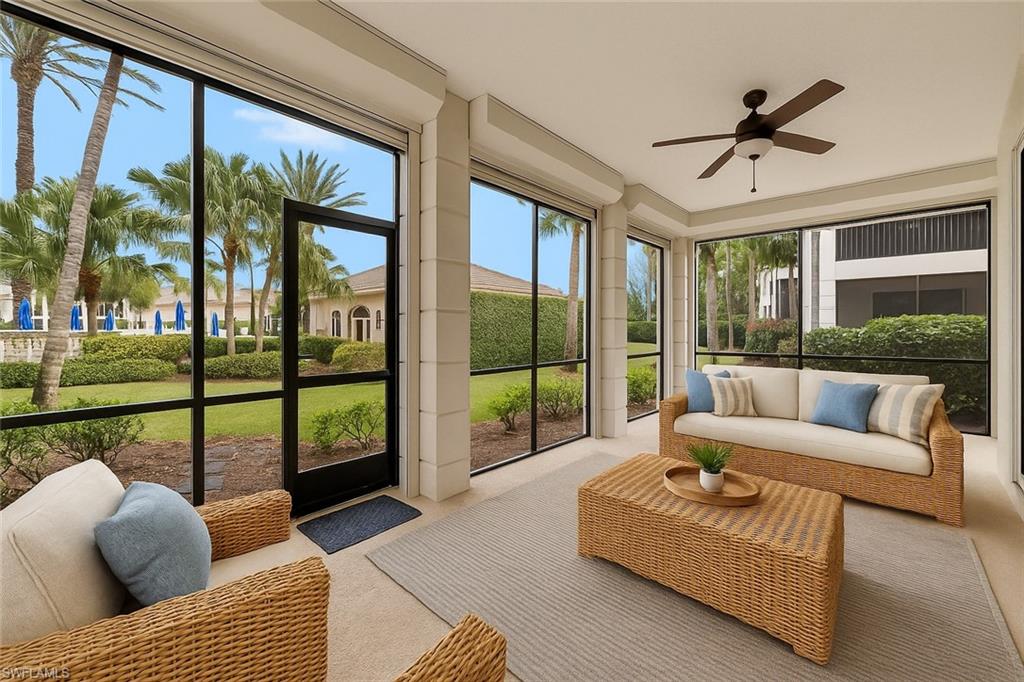 Large screened in patio with hurricane shutters staged