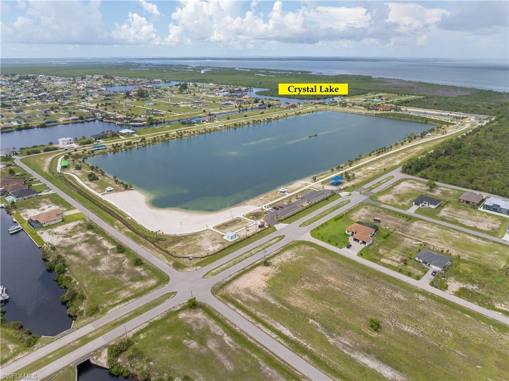 Aerial overview of property's location featuring a large body of water
