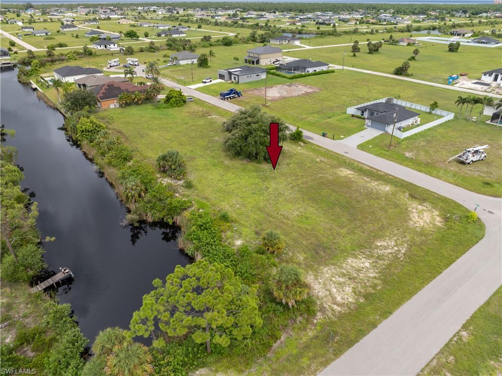 View of property location with a nearby body of water