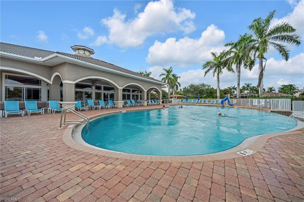 Community pool featuring a patio area