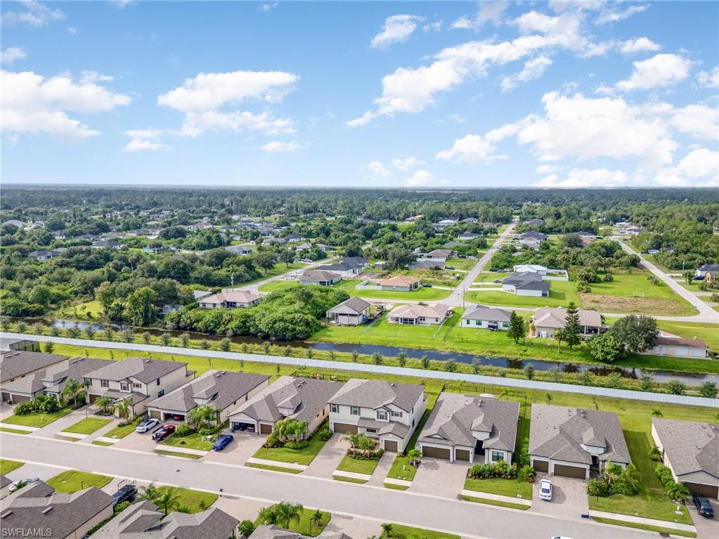 Aerial view of residential area with a nearby body of water