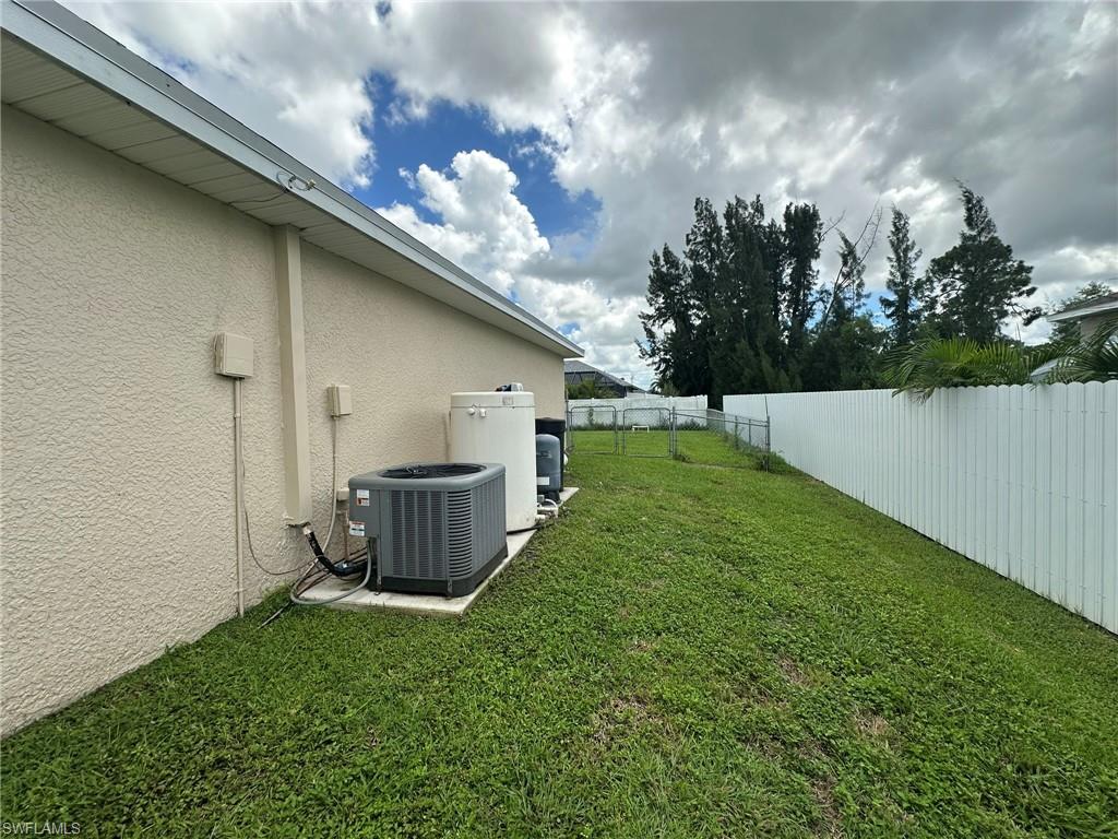 View of fenced backyard