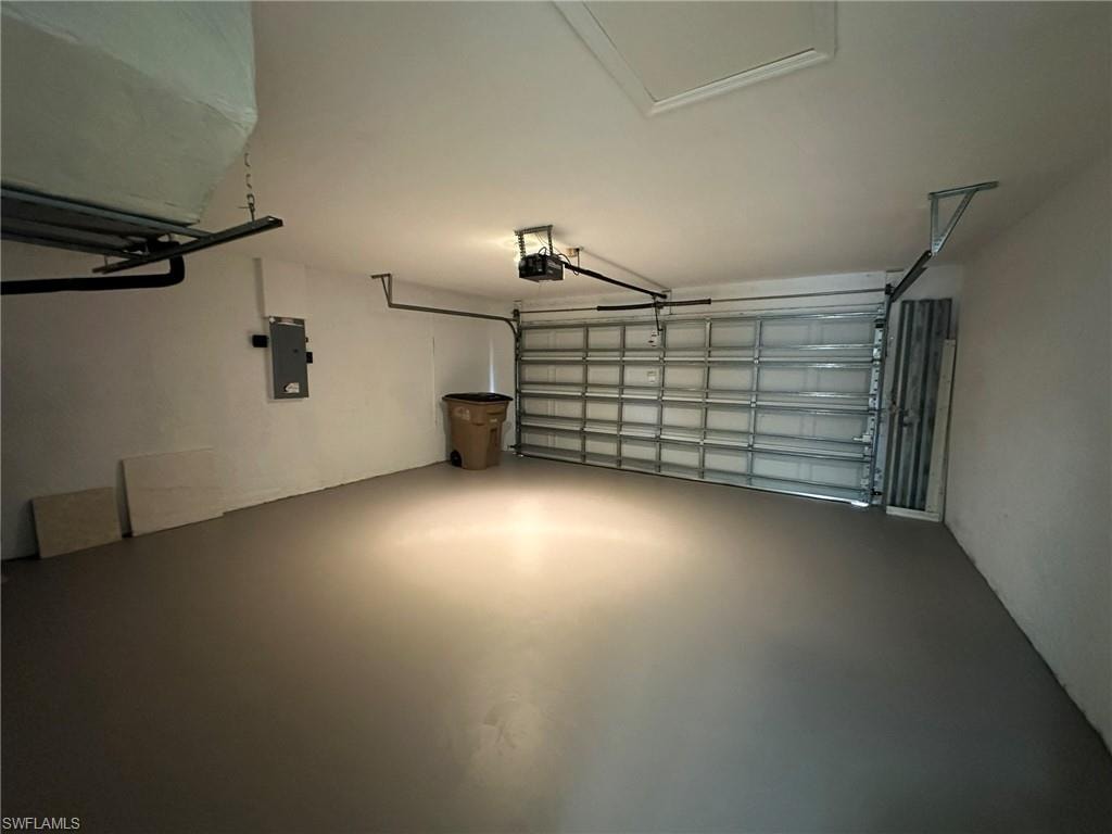 Garage featuring electric panel