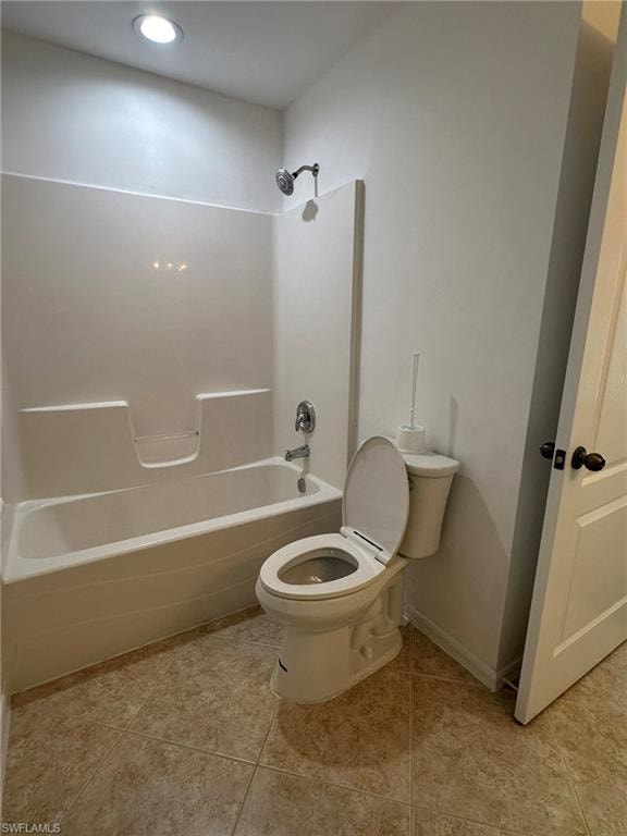 Full bathroom featuring  shower combination and light tile patterned flooring