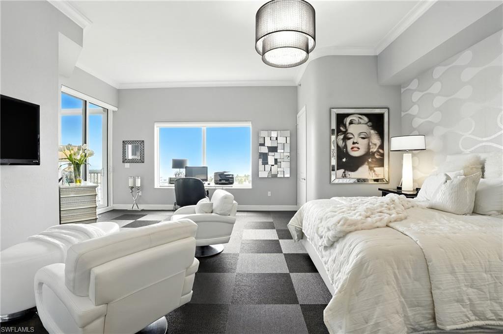 Bedroom with ornamental molding and access to exterior - Virtually Edited Image