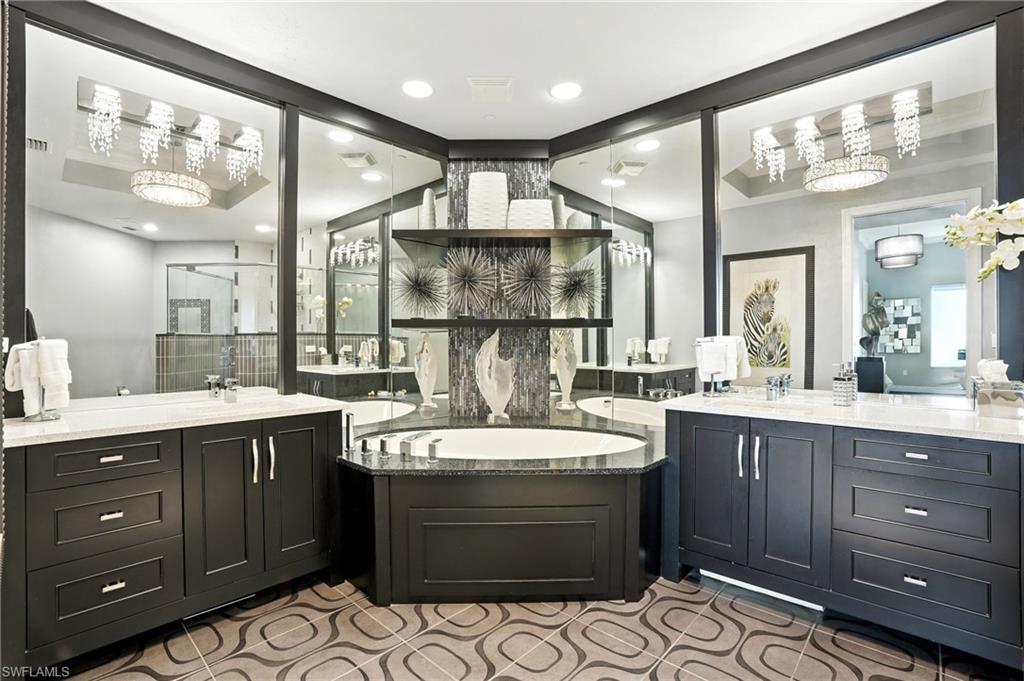 Bathroom featuring two vanities and a shower stall - Virtually Edited Image