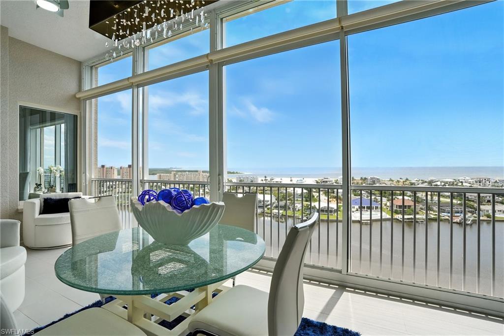 Sunroom / solarium with a water view - Virtually Edited Image