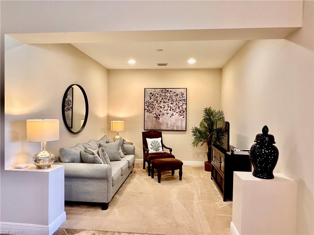 Living room with carpet floors