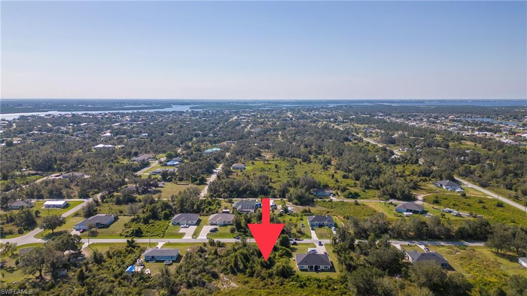 View of property location featuring nearby suburban area