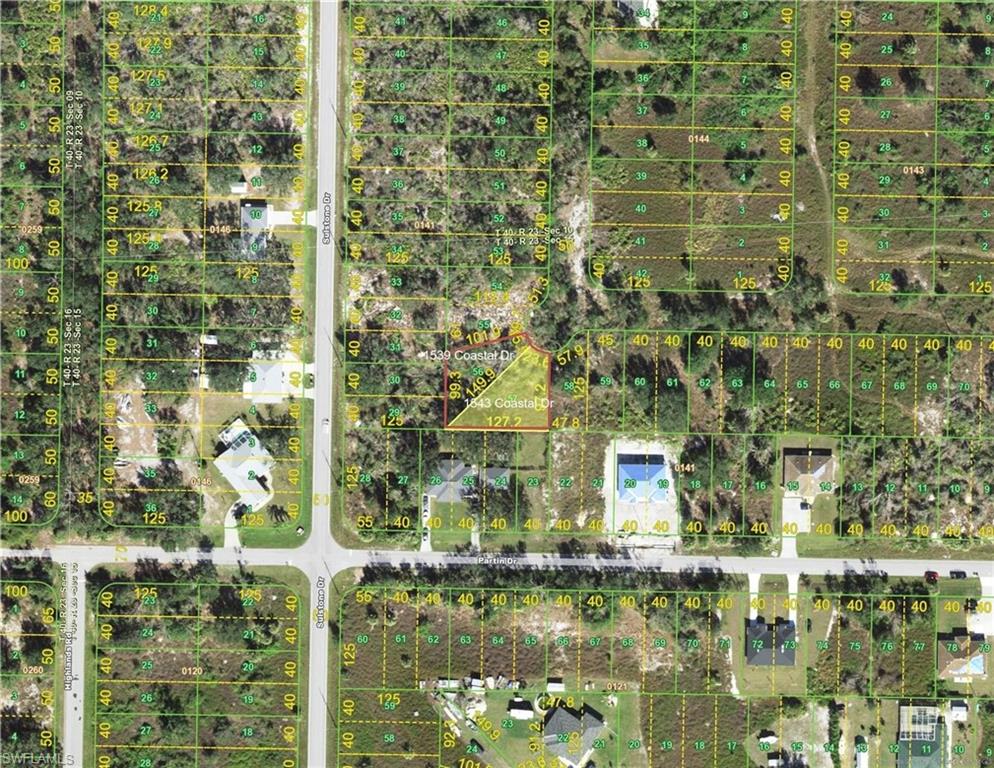 Aerial map of property and surrounding area featuring property boundaries highlighted