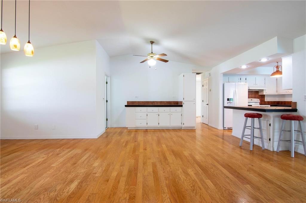 Vaulted ceilings, plenty of natural light and the beautiful flooring provide key features for this property!