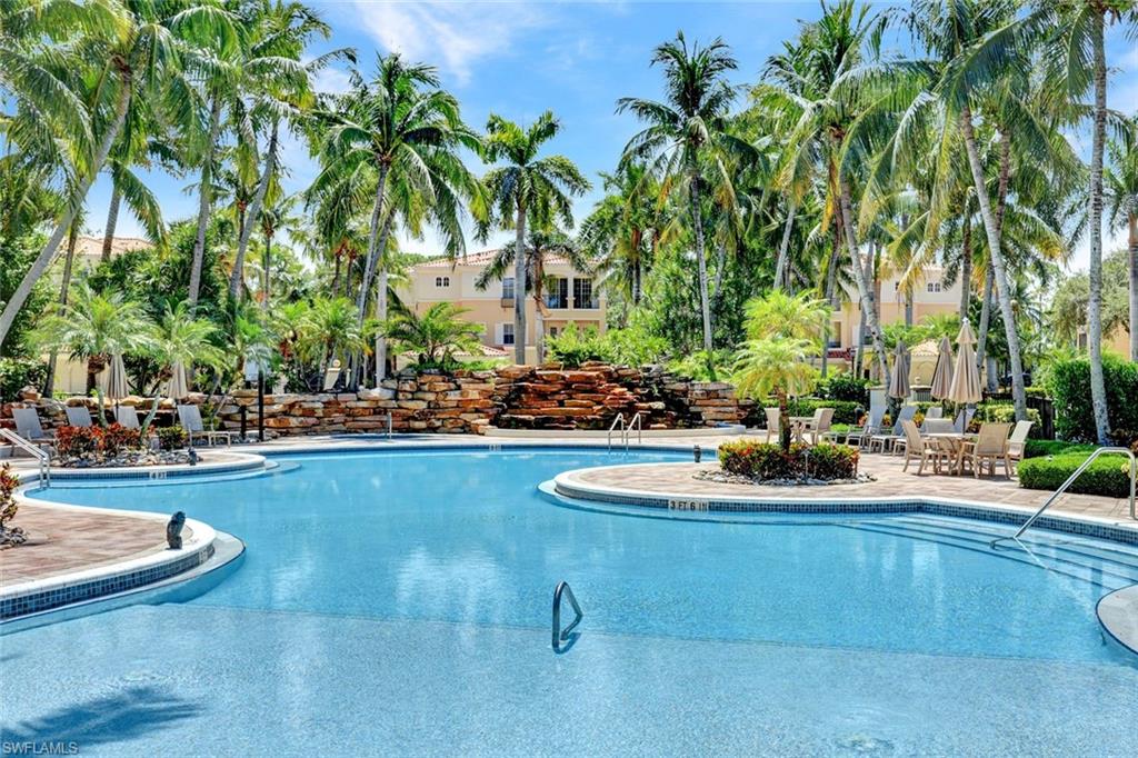 Community pool with a patio area