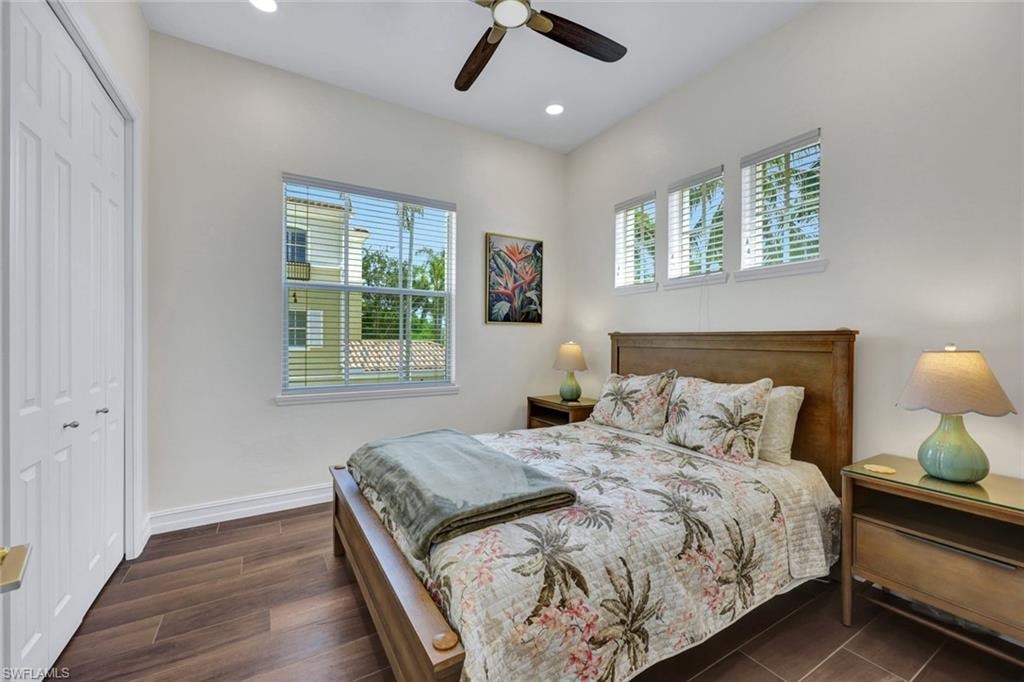 Bedroom featuring a closet, ceiling fan, recessed lighting, and dark wood-type flooring