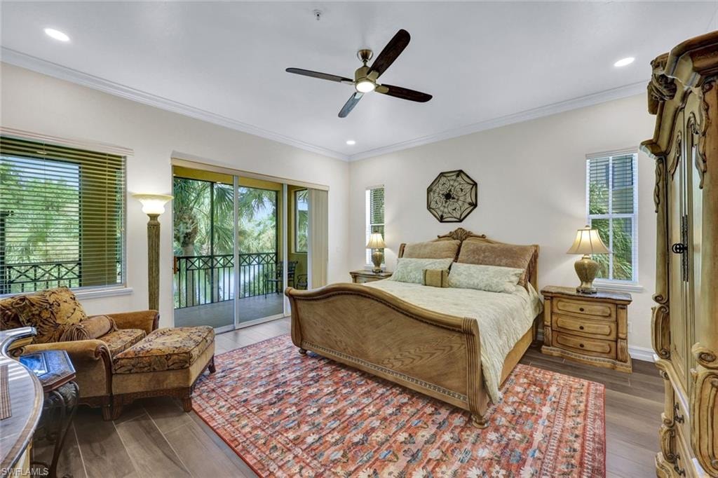 Bedroom featuring crown molding, access to exterior, wood finished floors, recessed lighting, and ceiling fan