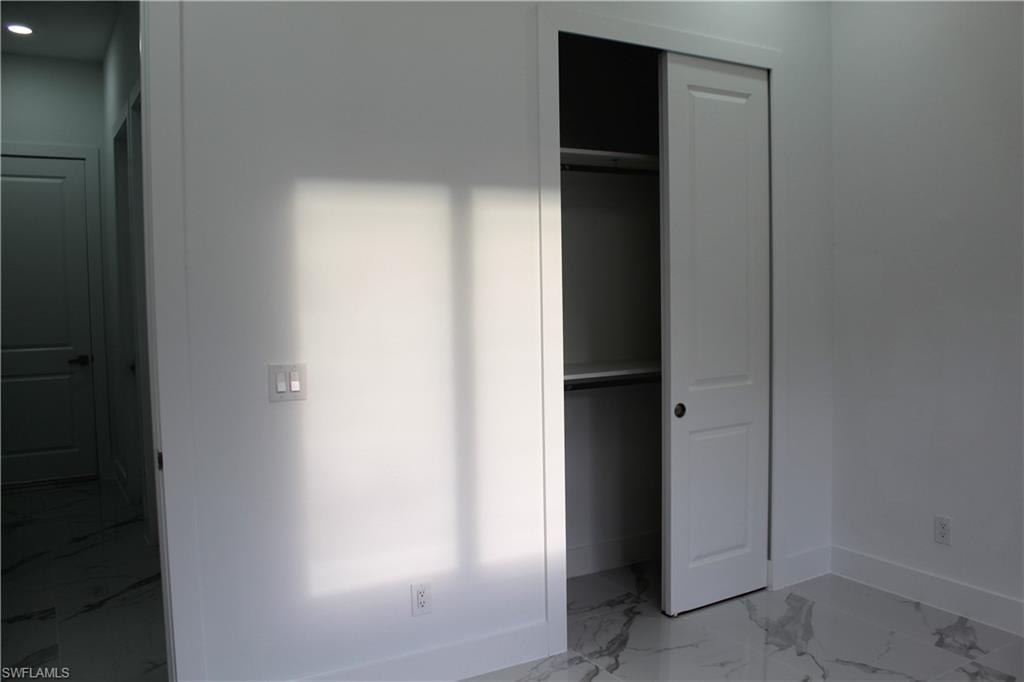 View of bed 3 closet orginizer