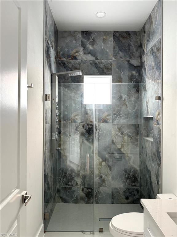 Guest bathroom with massage shower tower