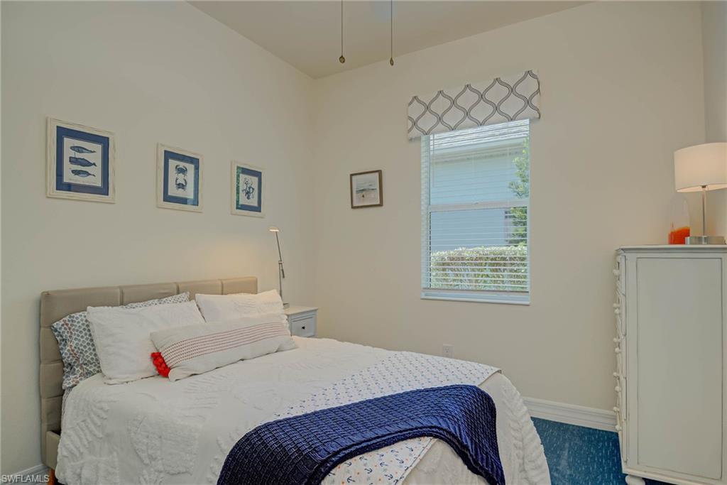 Bedroom featuring baseboards