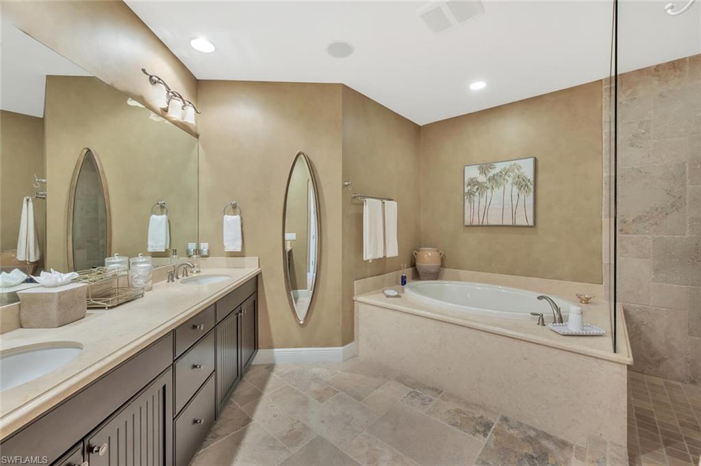 Dual sinks, soaking tub plus walk-in shower.