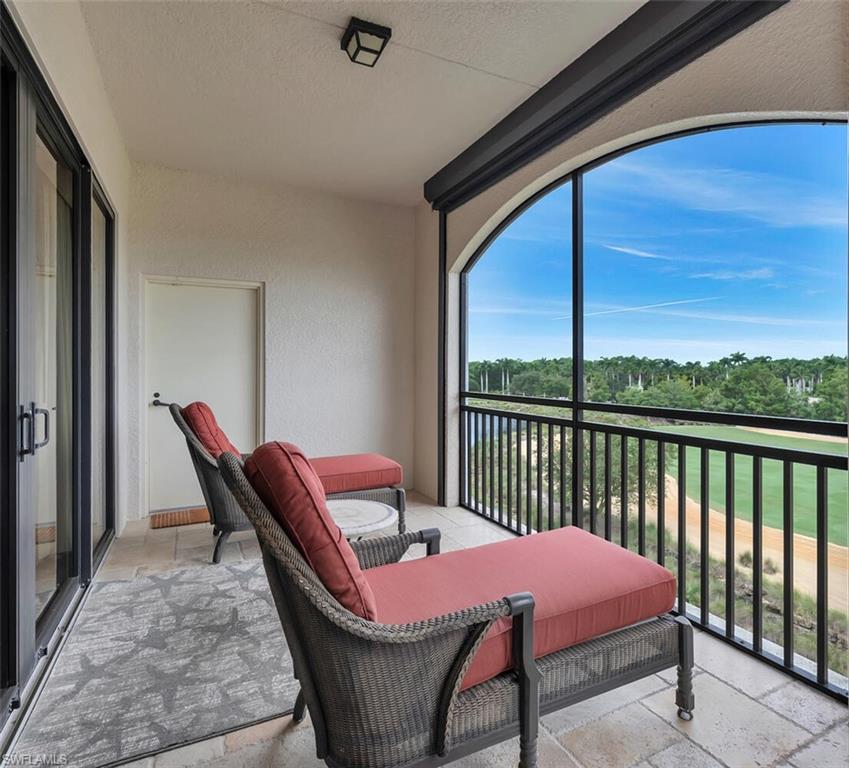 Master bedroom balcony with water & golf course views.