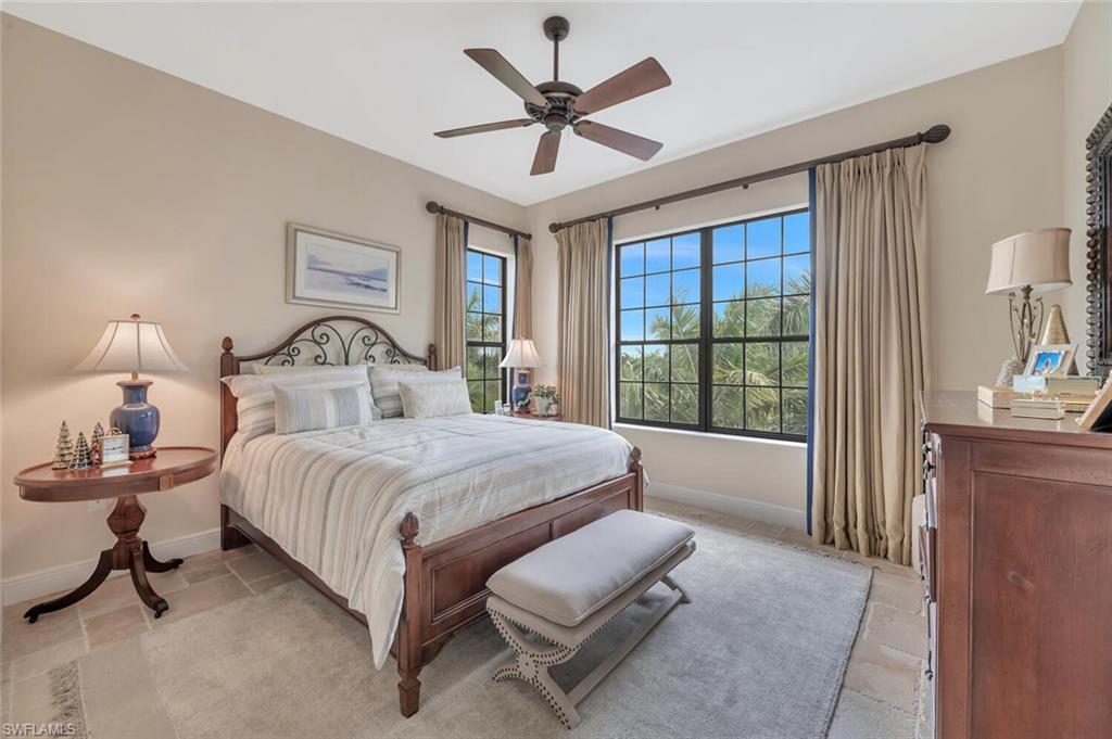 Second guest suite with golf & palm views.