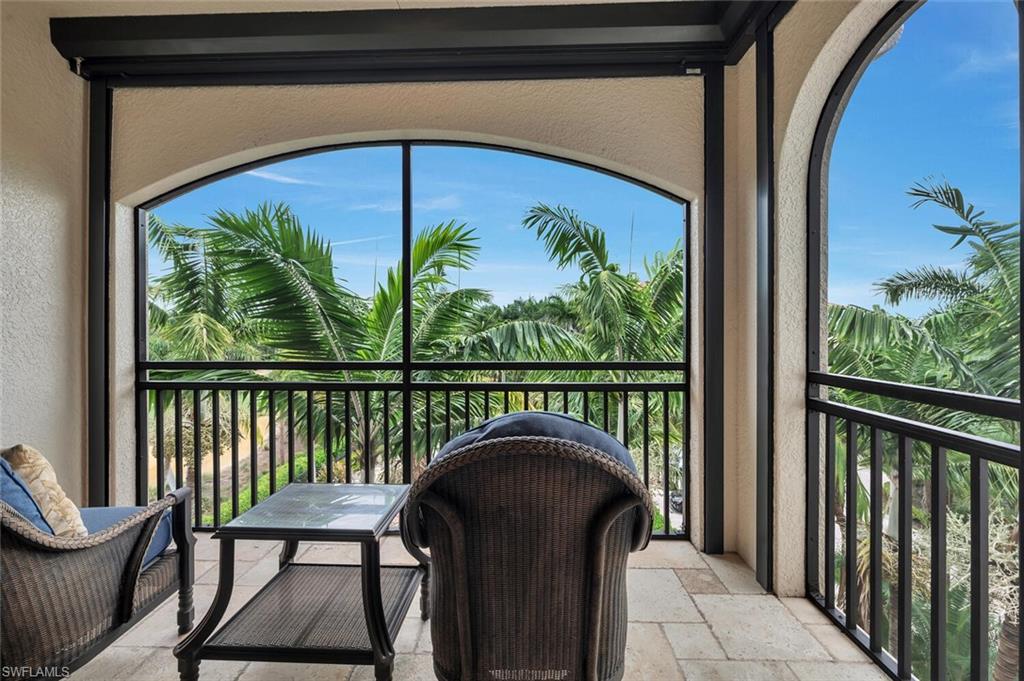 Palm & golf course views from the office screened balcony