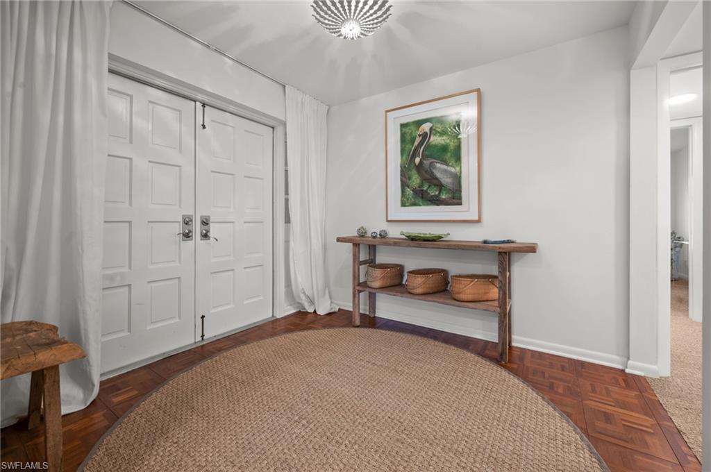 Double door entrance foyer with custom lighting!