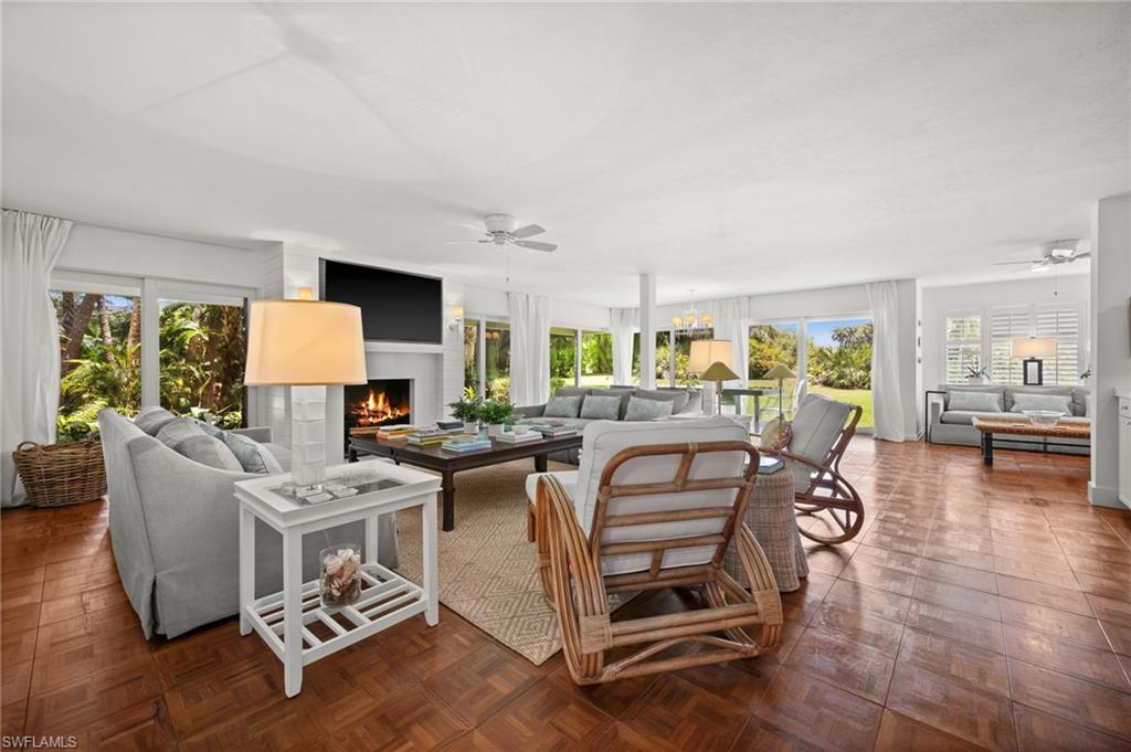 Living area surrounds by hurricane impact sliding glass doors!