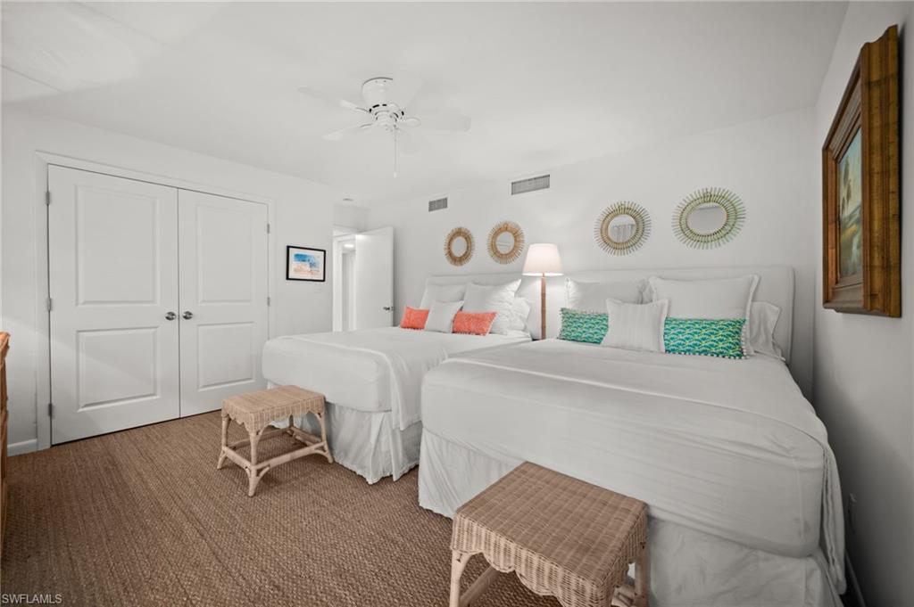 Guest bedroom 2 is also oversized with a large, double door closet and hurricane sliders to the private patio!