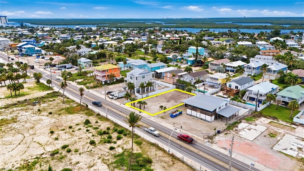 VIRTUALLY ENHANCED - Cleared lot with direct road frontage, surrounded by established residential properties