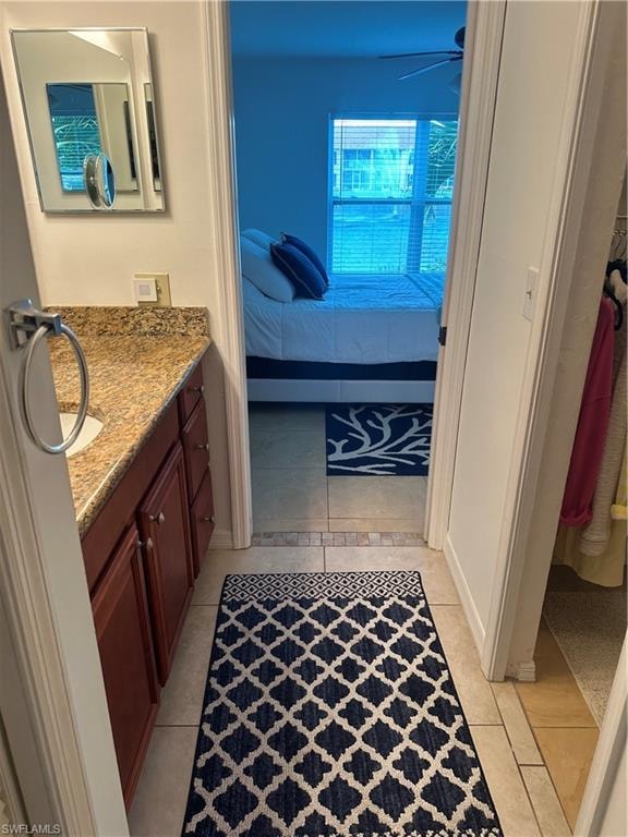 Bathroom with vanity and tile patterned flooring