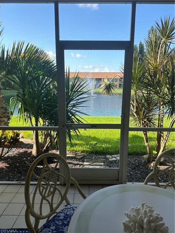 Water and fountain view Details with tile patterned floors