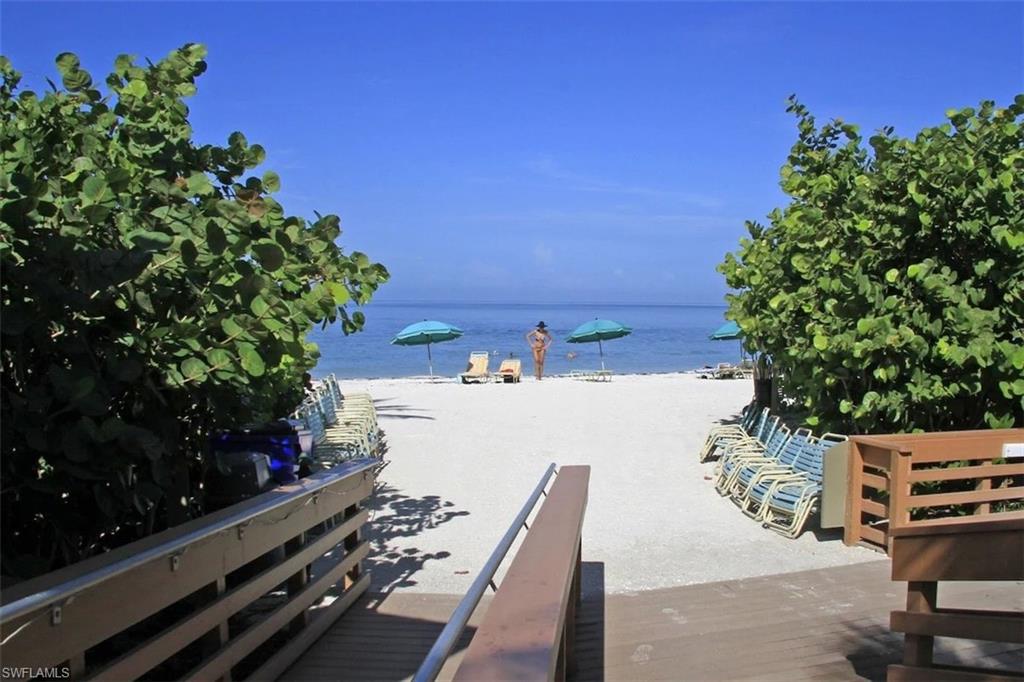 Property view of water with a view of the beach