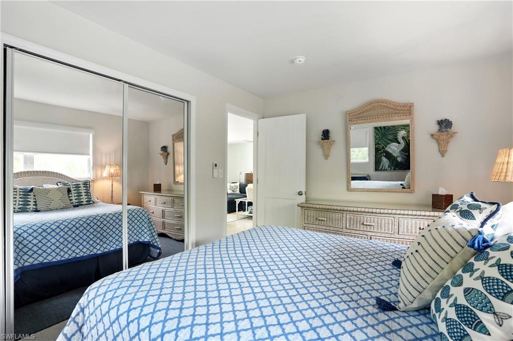 Bedroom with a closet and carpet flooring