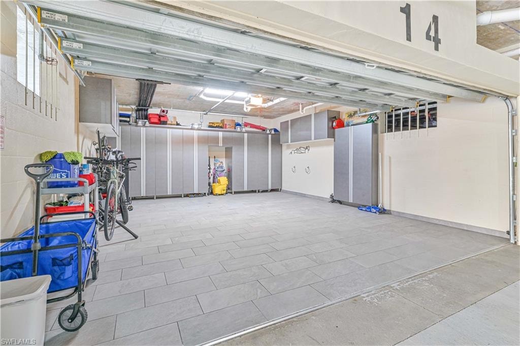 Garage featuring a garage door opener
