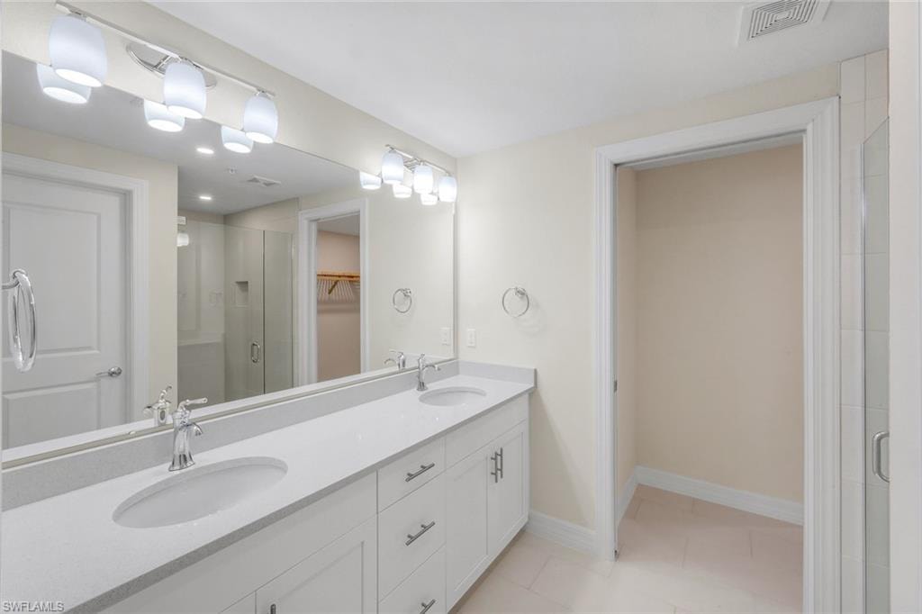 Primary Bath Flipped floor plan from one side of coach home building to the other