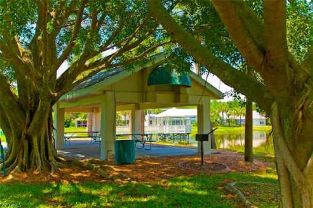View of home's community with a gazebo and a water view