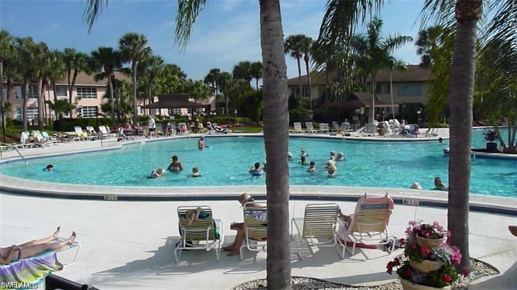 Community pool featuring a patio area