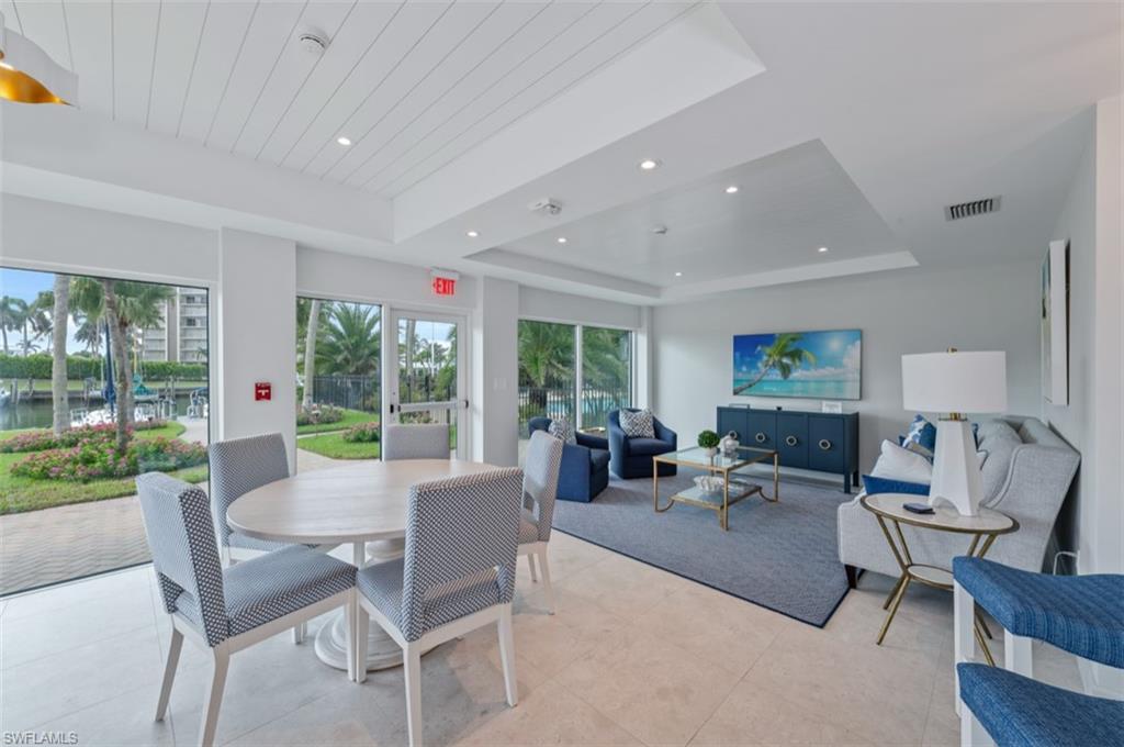 Renovated social room with kitchen for entertaining, personal use, or community events.