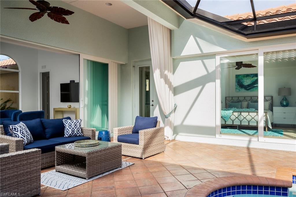 View of patio featuring a ceiling fan and an outdoor hangout area